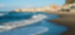 view-of-Cefalu-old-town-on-the-beach