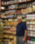 man in a grocery store in rome